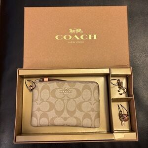 Coach Tan Signature Wristlet and bag charm Set NEW IN BOX